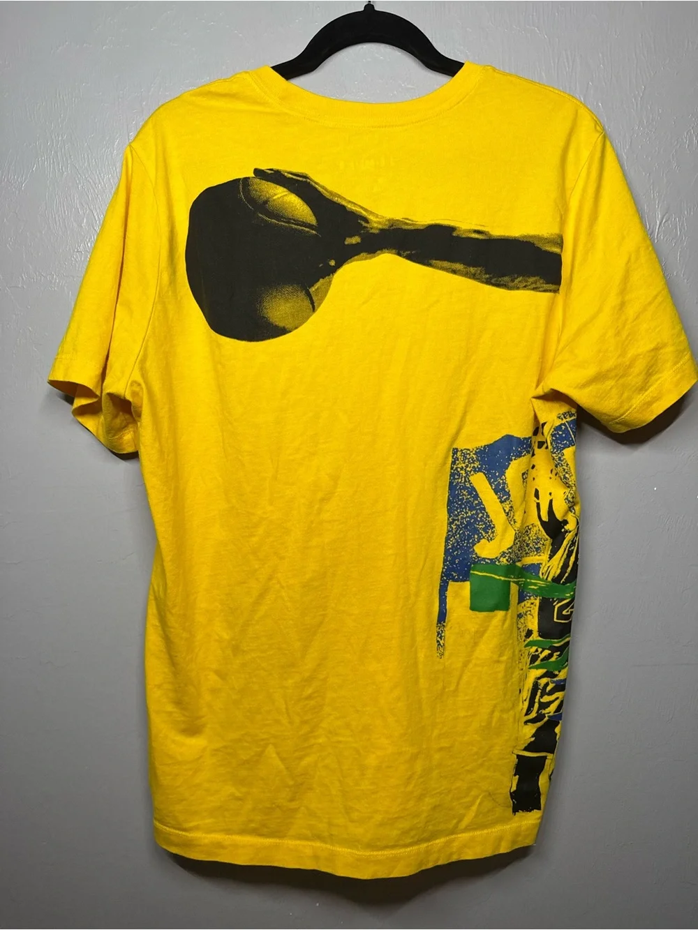 Jordan Short Sleeve Graphic Tee - Yellow with Red, Black, Blue Accents